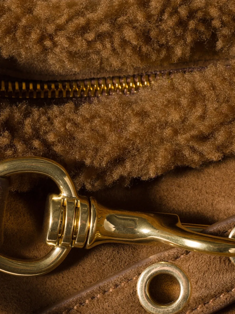 Close up of brown bag, showing texture of the sheep skin fabric