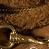 Close up of brown bag, showing texture of the sheep skin fabric