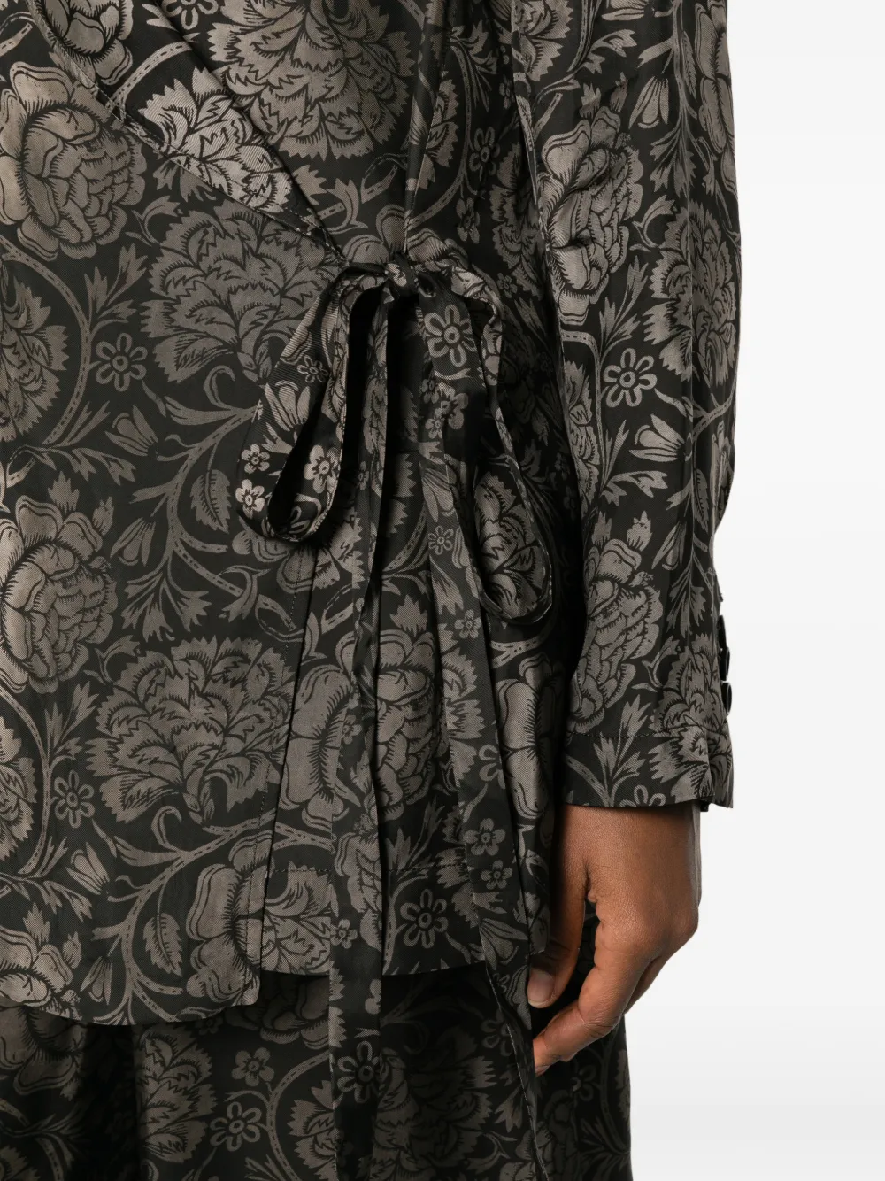 Close up of black jacket, showing texture of the Viscose and  Cupro fabric