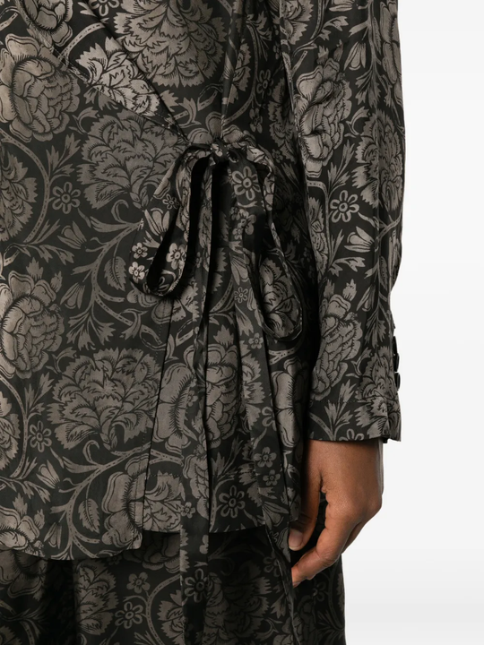 Close up of black jacket, showing texture of the Viscose and  Cupro fabric