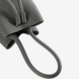Close up of grey bags, showing texture of the fabric