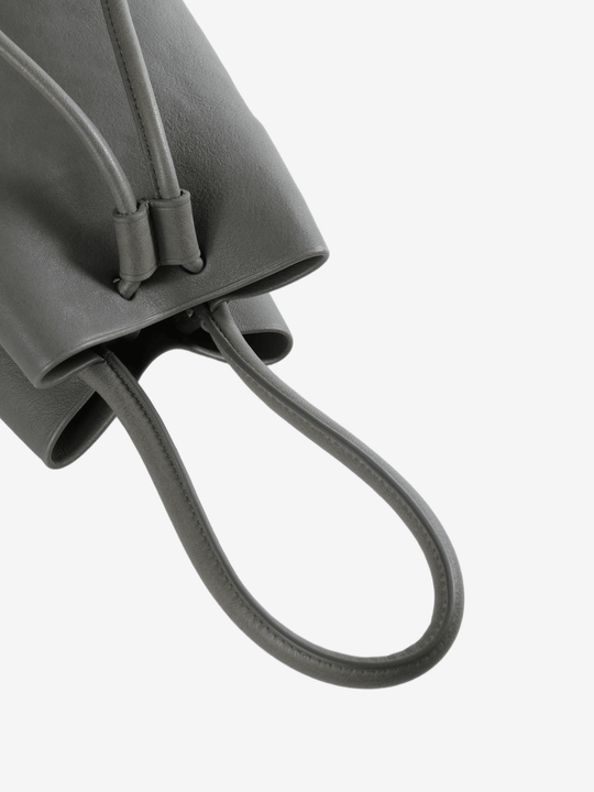 Close up of grey bags, showing texture of the fabric