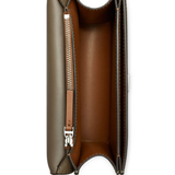 Close up of brown bags, showing texture of the leather fabric