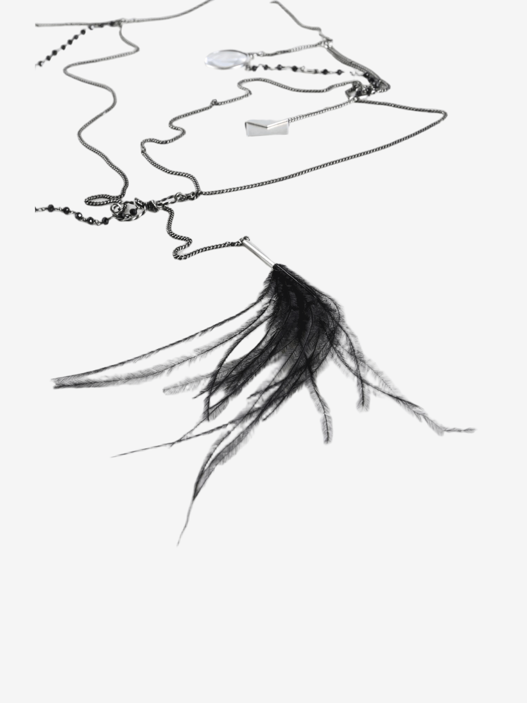 Close up of grey necklace,showing texture of the brass fabric