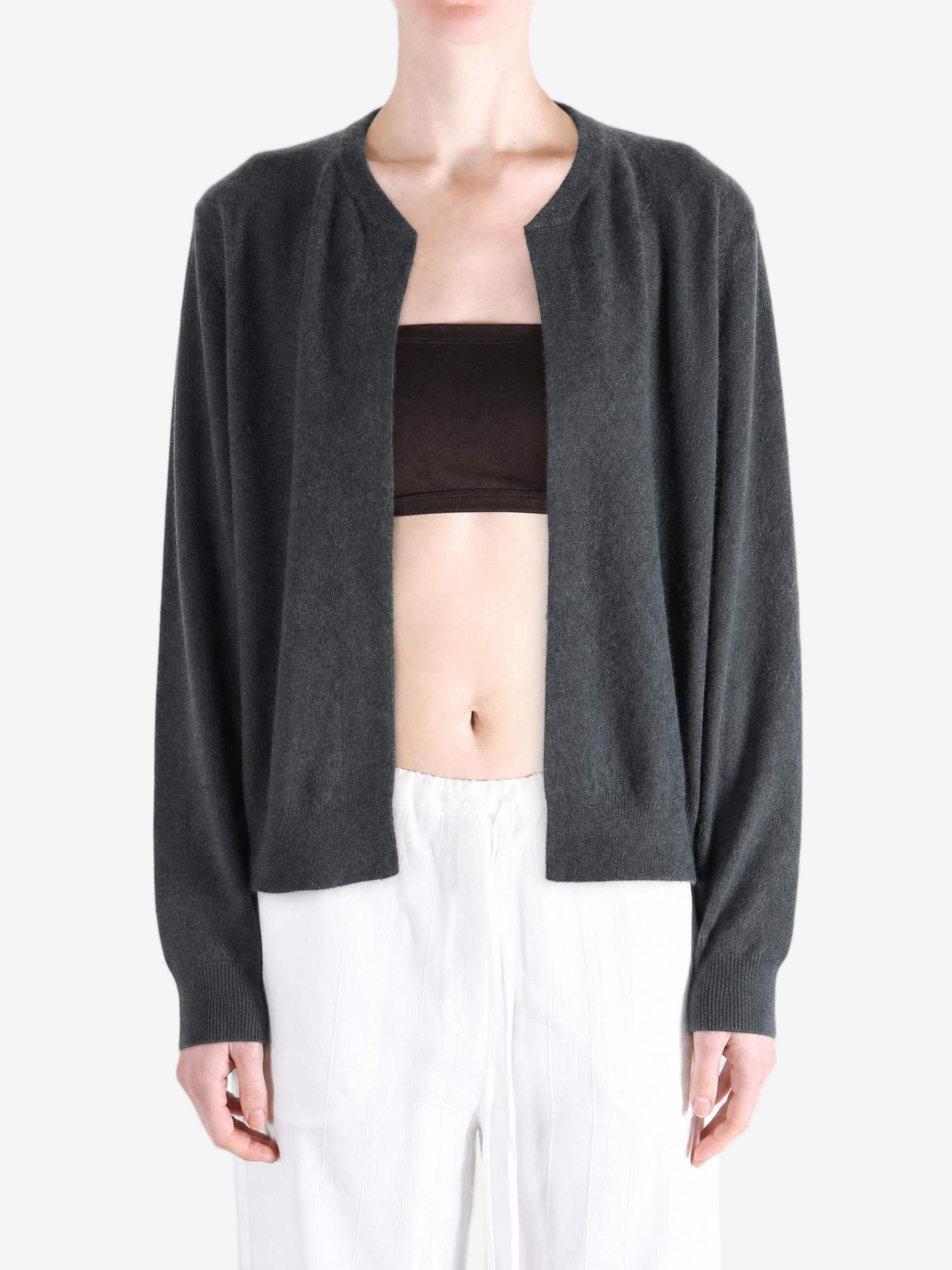 Grey hoodie worn by a person, showing the hoodie fit
