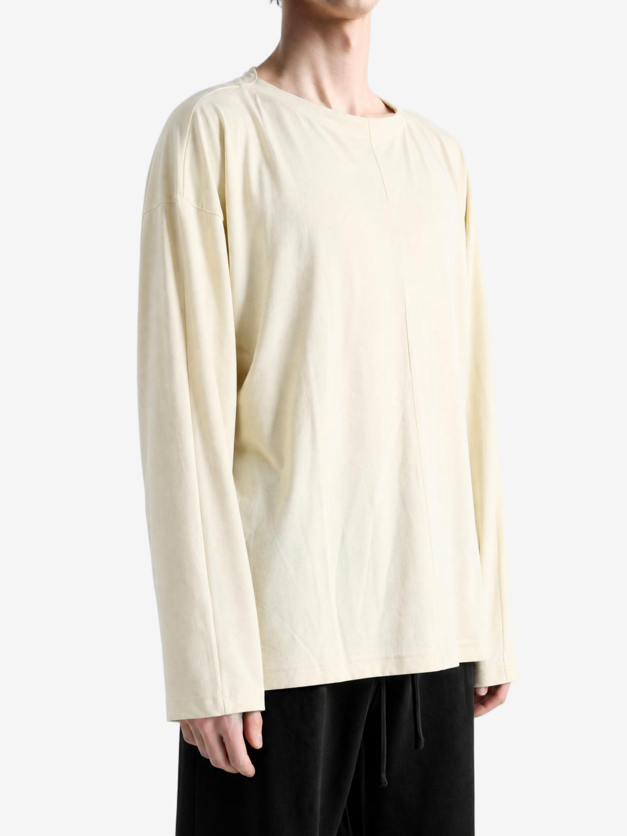 Tan top worn by a person, showing the top fit