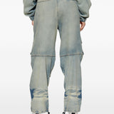 Blue pants worn by a person, showing the pants fit