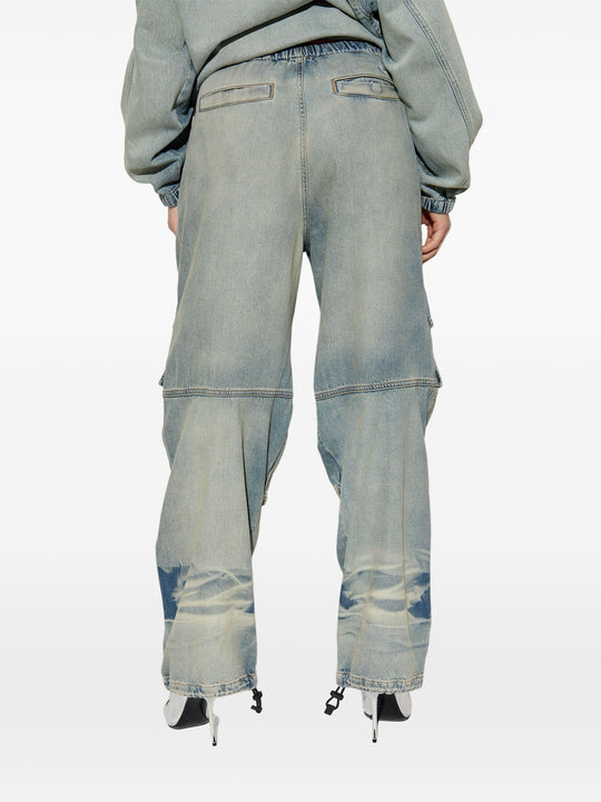 Blue pants worn by a person, showing the pants fit