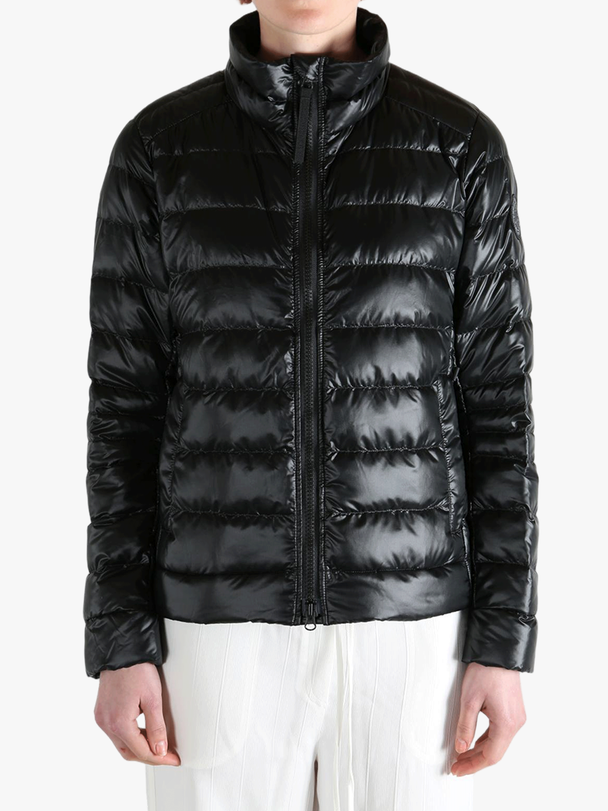 Black jacket worn by a person, showing the jacket's fit