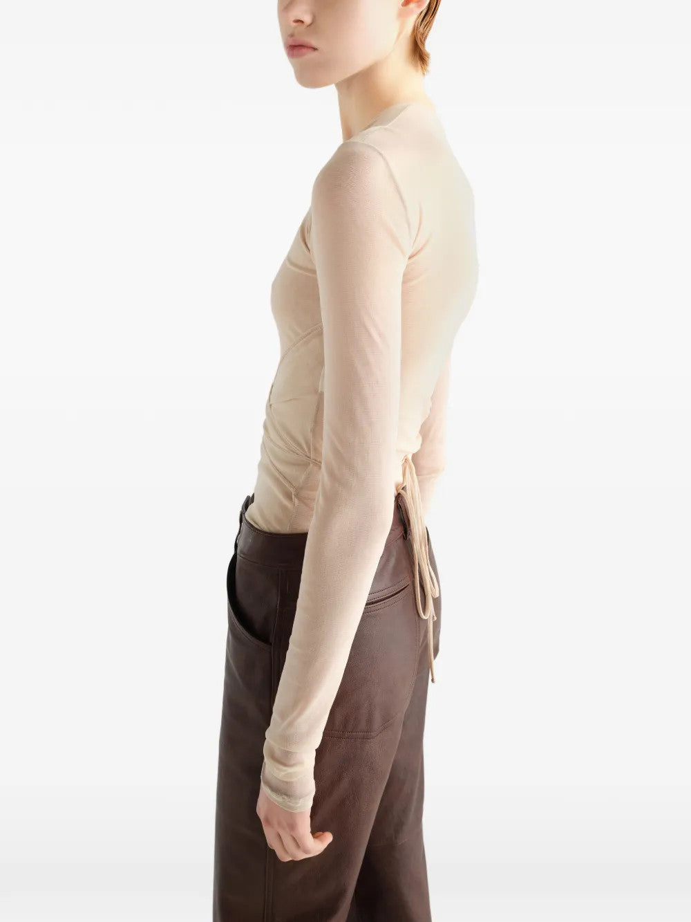 Tan top worn by a person, showing the top fit