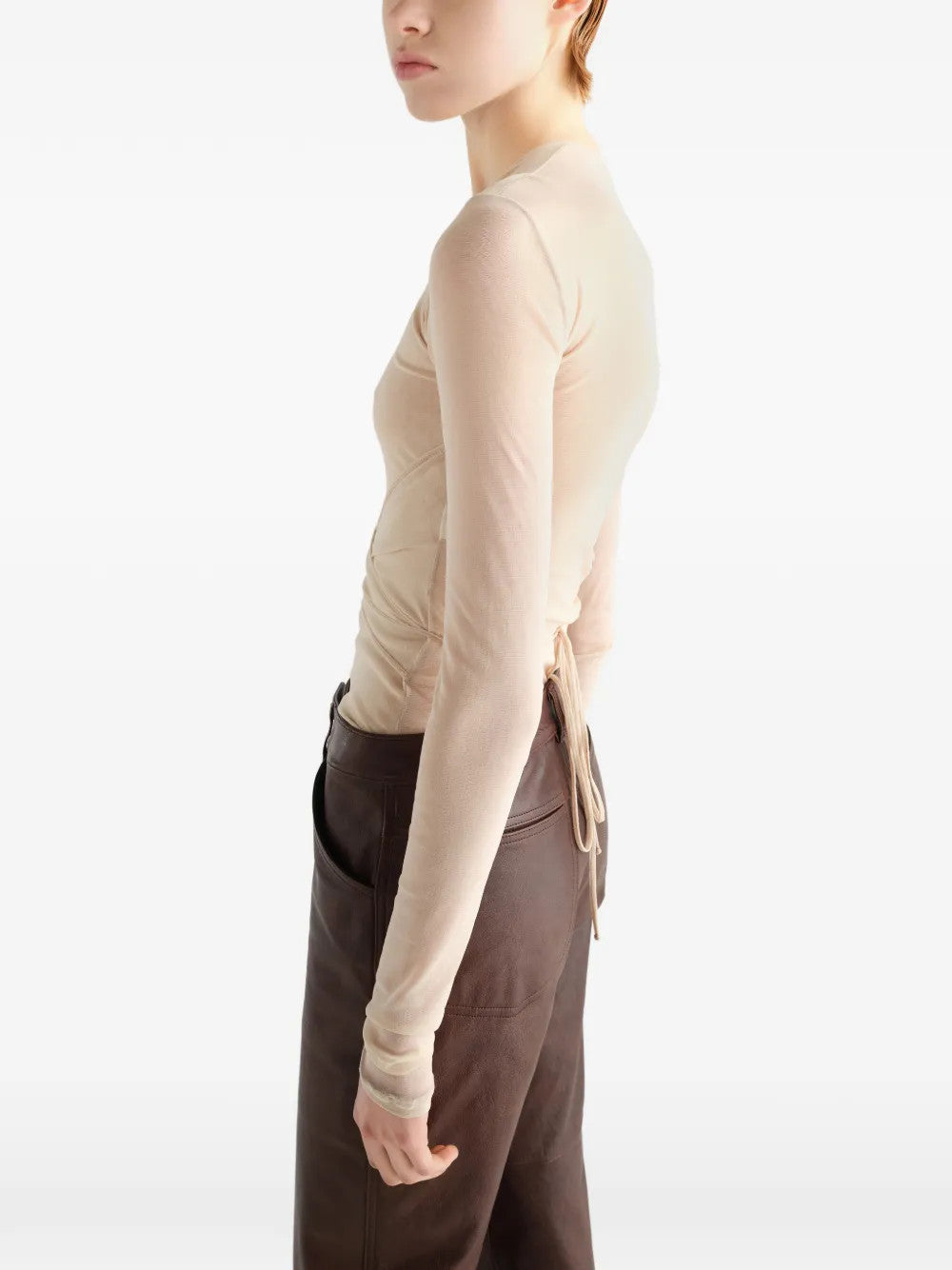 Tan top worn by a person, showing the top fit