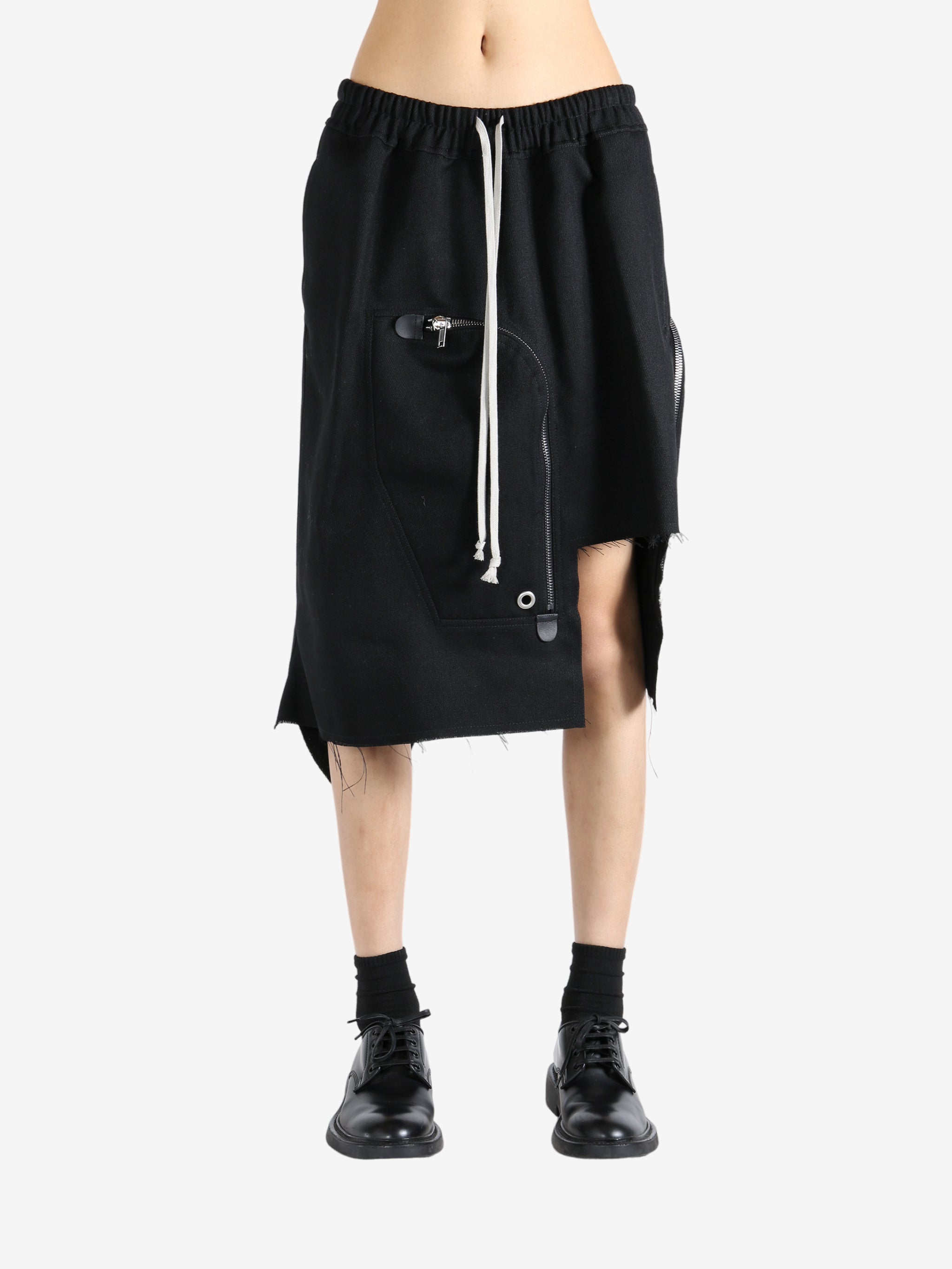 Black skirt worn by a person, showing the skirt fit