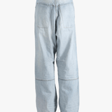 Blue pant worn by a person, showing the fit