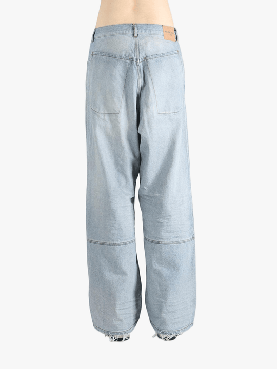 Blue pant worn by a person, showing the fit