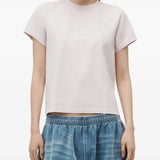 Pink t-shirt worn by a person, showing the t-shirt fit