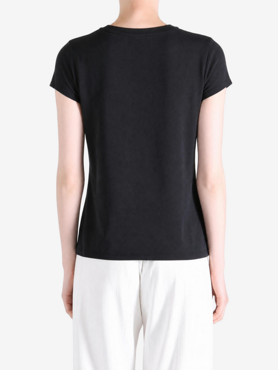 Black t-shirt worn by a person, showing the t-shirt fit