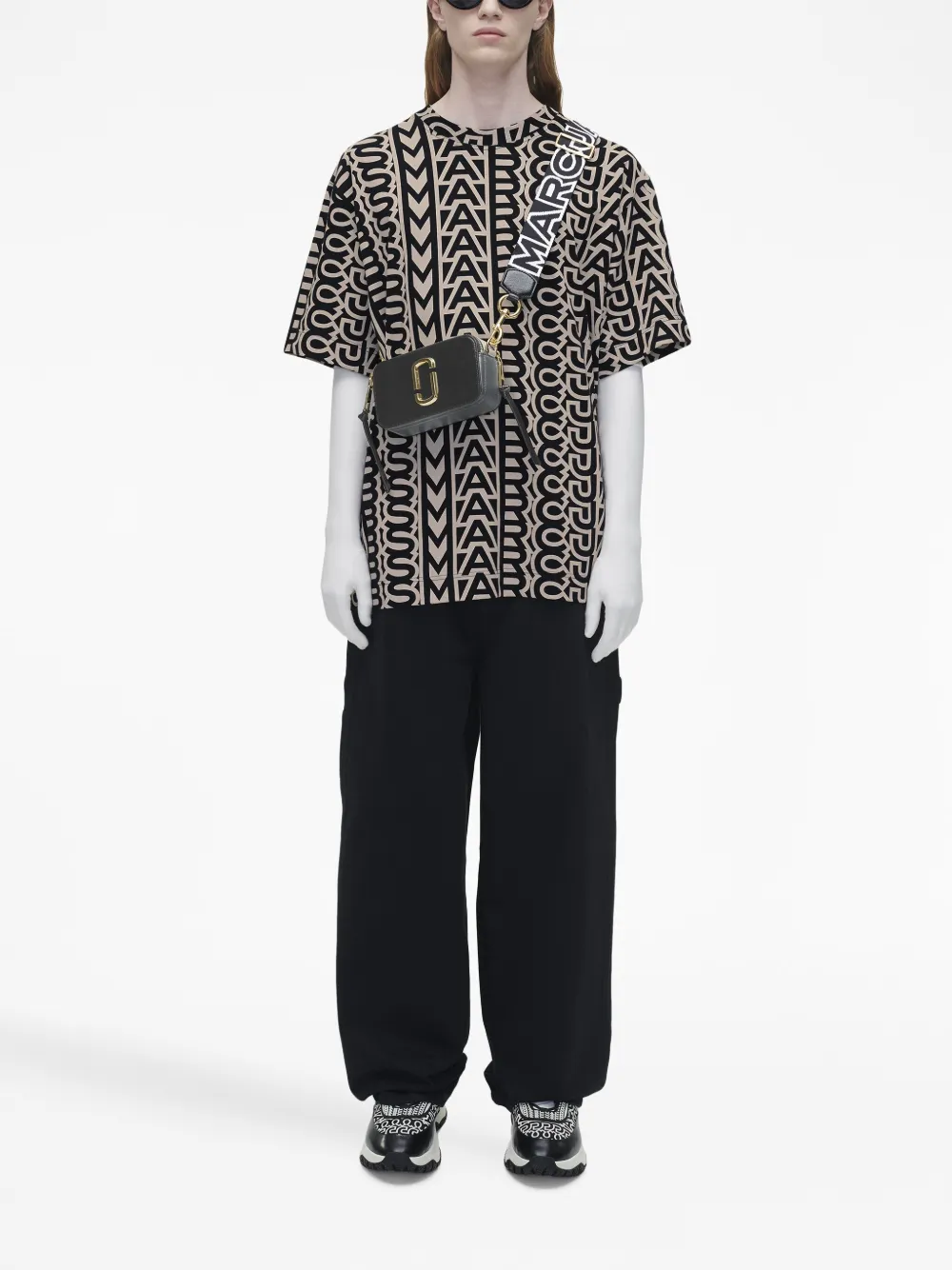 black bags,worn by a person, showing the bags fit