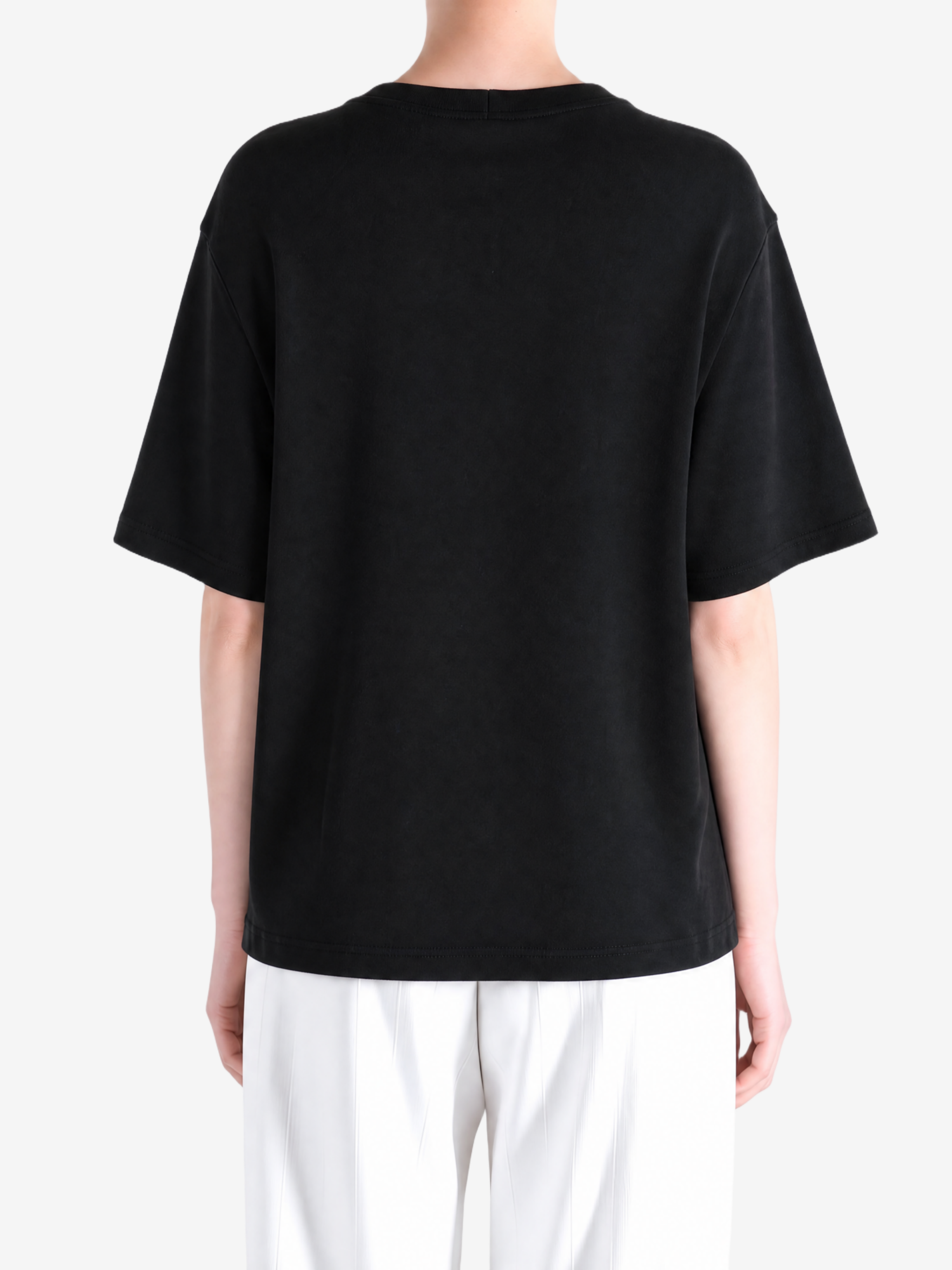 Black t-shirt worn by a person, showing the t-shirt fit