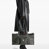 Black bag worn by a person, showing the bag fit