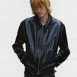 Black jacket worn by a person, showing the jacket's fit