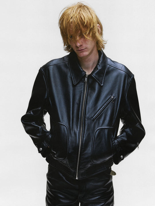 Black jacket worn by a person, showing the jacket's fit