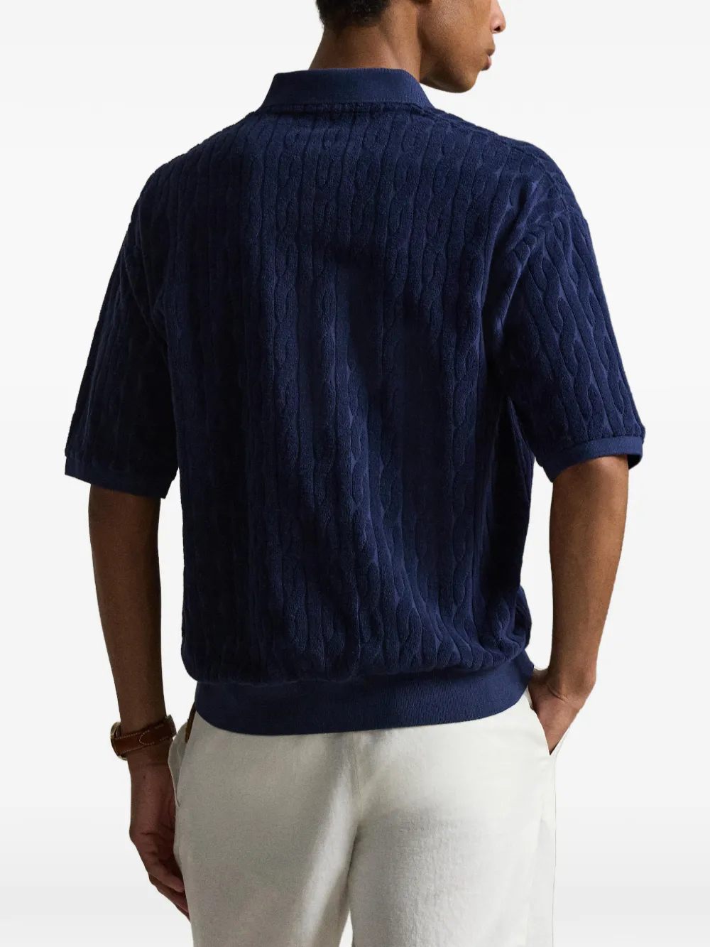 Blue shirt worn by a person, showing the shirt fit