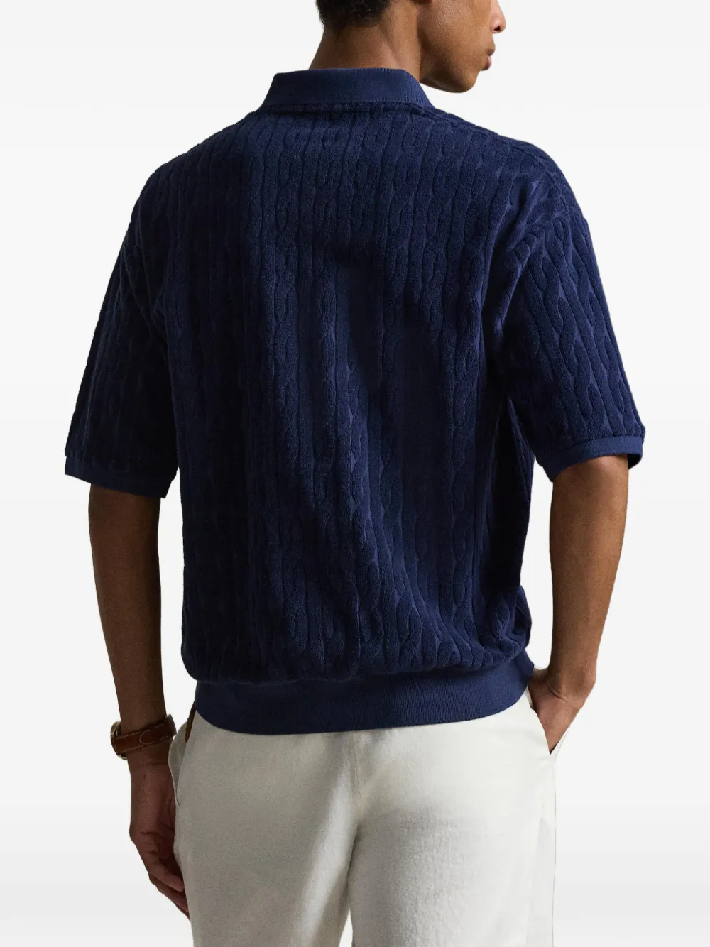 Blue shirt worn by a person, showing the shirt fit