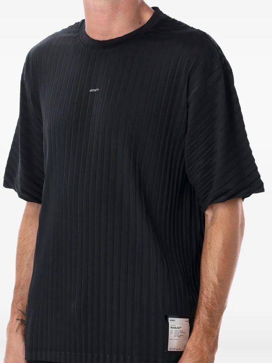 Close up of black t-shirt,showing texture of the polyester fabric