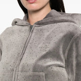 Close up of the grey hoodie, showing texture of the cotton fabric