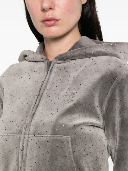 Close up of the grey hoodie, showing texture of the cotton fabric