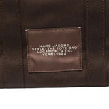 Close up of brown bag, showing texture of the cotton fabric