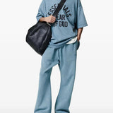 Blue t-shirts, full body view