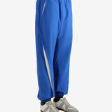 Blue pants worn by a person, showing the pants' fit