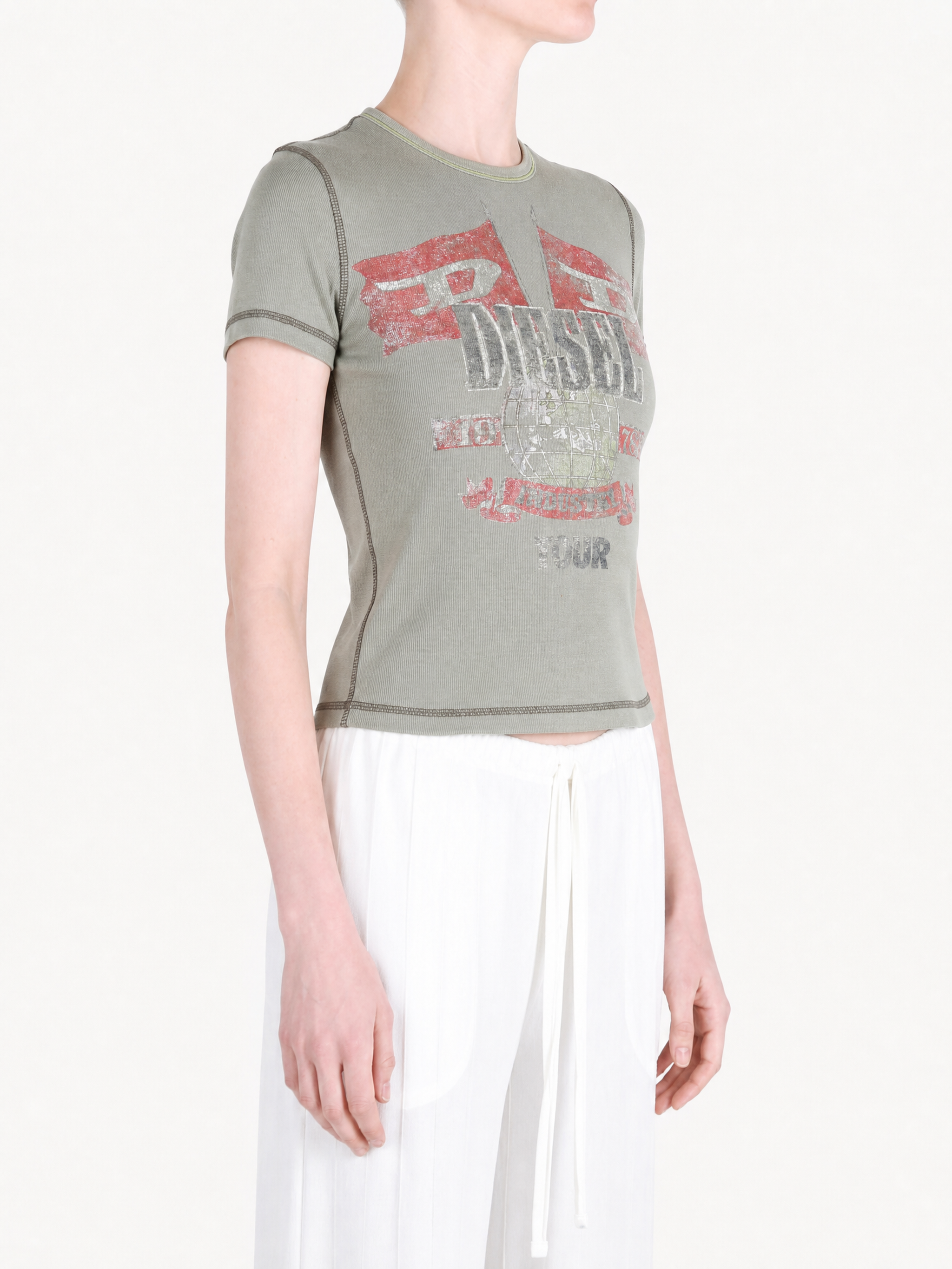 Green t-shirt worn by a person, showing the t-shirt fit