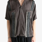 Bronwn T-shirt worn by a person, showing the T-shirt's fit