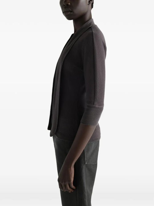 Grey t-shirt worn by a person, showing the t-shirt fit
