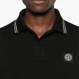 Close up of Black shirt, showing texture of the cotton fabric