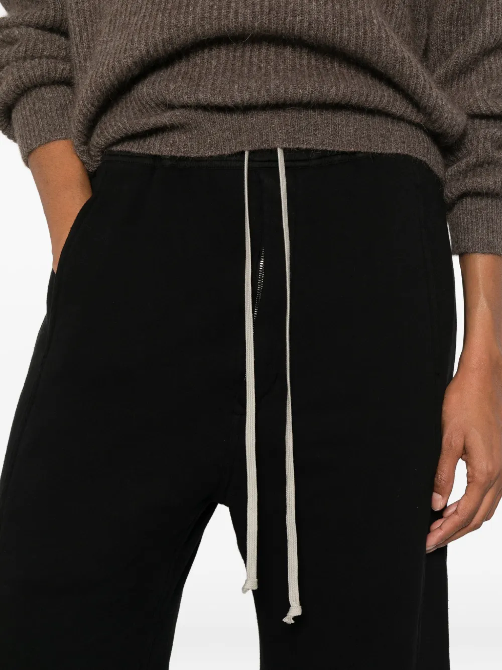 Close up of black pants , showing texture of the cotton fabric