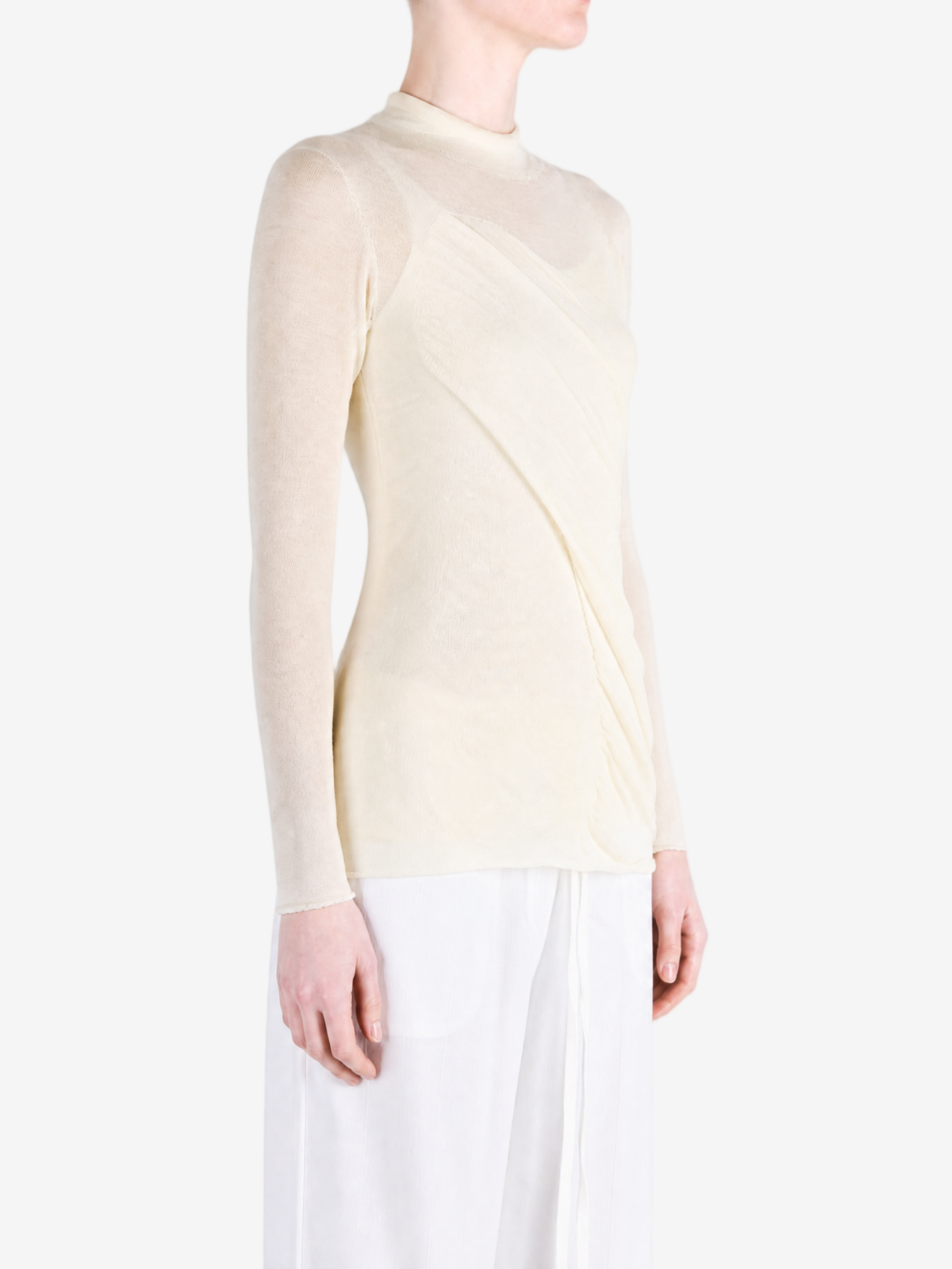 Tan top worn by a person, showing the top fit