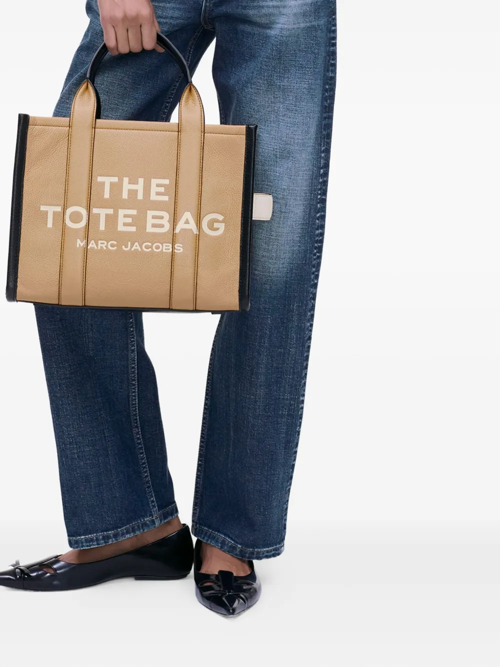 Brown bag worn by a person, showing the bag's fit