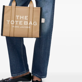 Brown bag worn by a person, showing the bag's fit