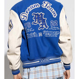 Blue jacket worn by a person, showing the jacket fit
