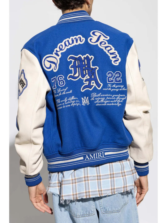 Blue jacket worn by a person, showing the jacket fit