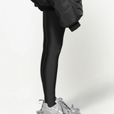 Gary sneaker  worn by a person, showing the sneaker's fit