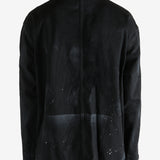 Black jackets worn by a person, showing the jackets fit