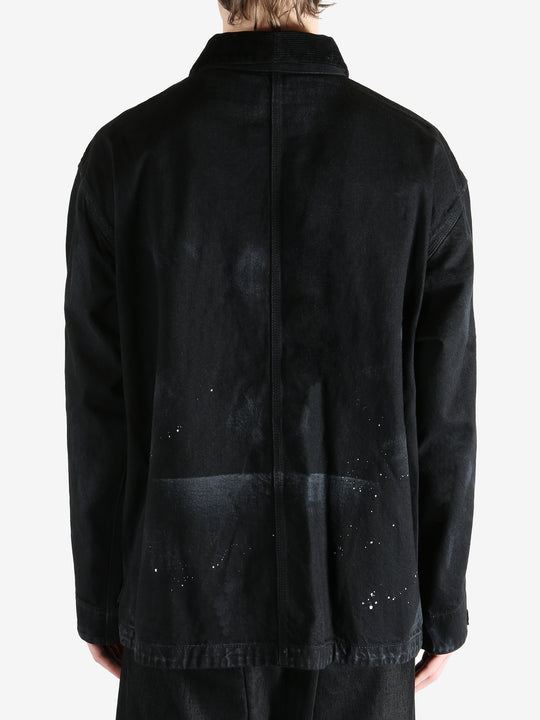 Black jackets worn by a person, showing the jackets fit