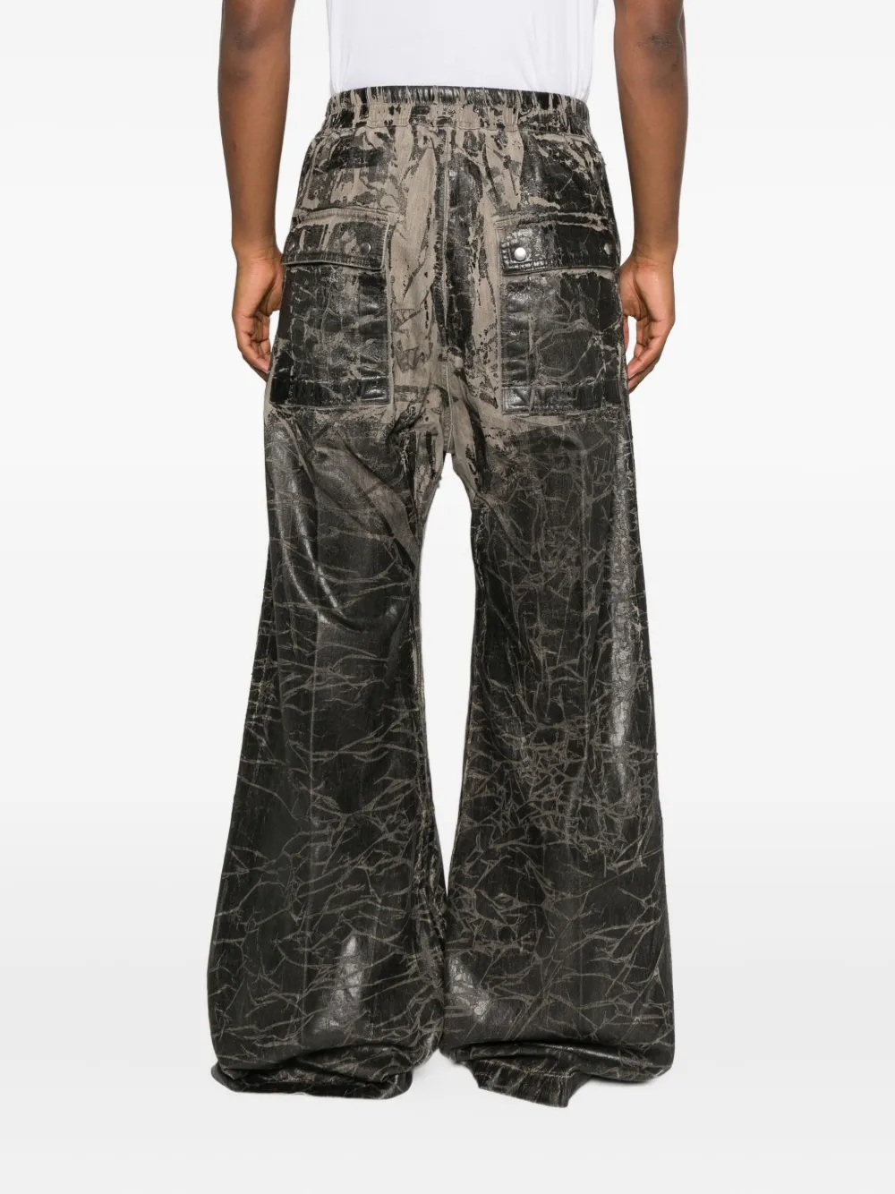 Grey pants worn by a person, showing the pants fit