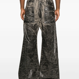 Grey pants worn by a person, showing the pants fit