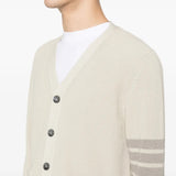 Close up of white cardigan, showing texture of the cotton fabirc