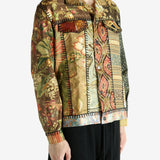 Brown jacket worn by a person, showing the jacket’s fit